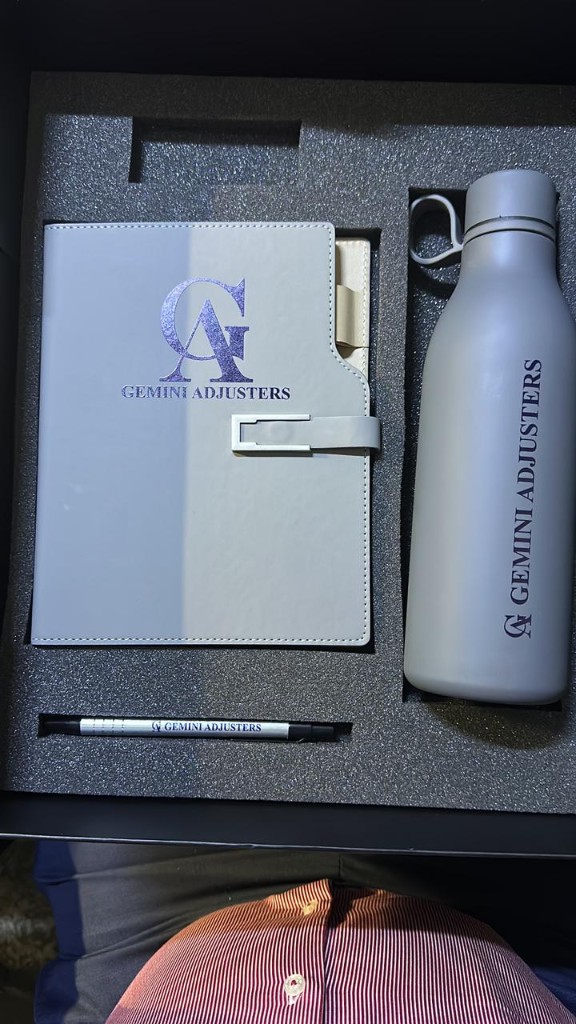 Branded Gemini Adjusters office gift set in a presentation box.